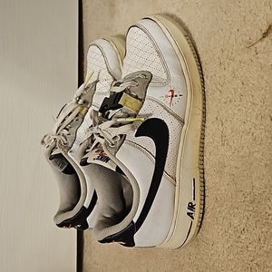 White air force 1s with clips and other things on the side